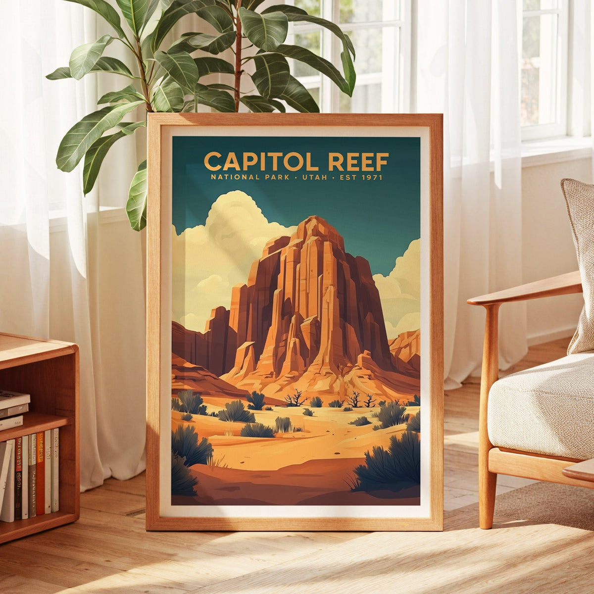 Capitol Reef National Park print in an oak frame by a sunlit window with sheer curtains