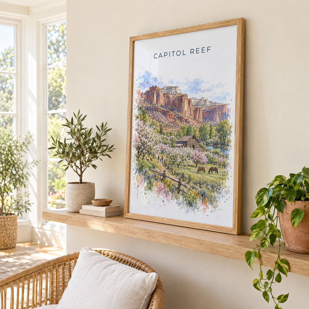 Capitol Reef National Park watercolor print in an oak frame on a picture ledge in a sunlit sunroom