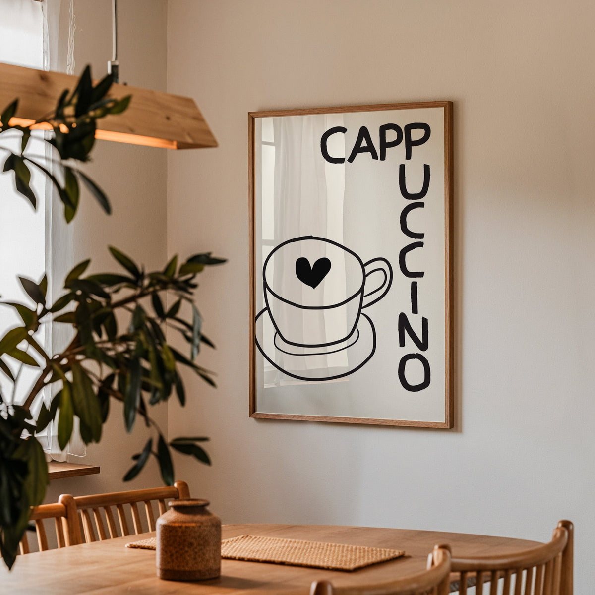 Cappuccino heart print in a walnut frame above a dining table by an olive tree
