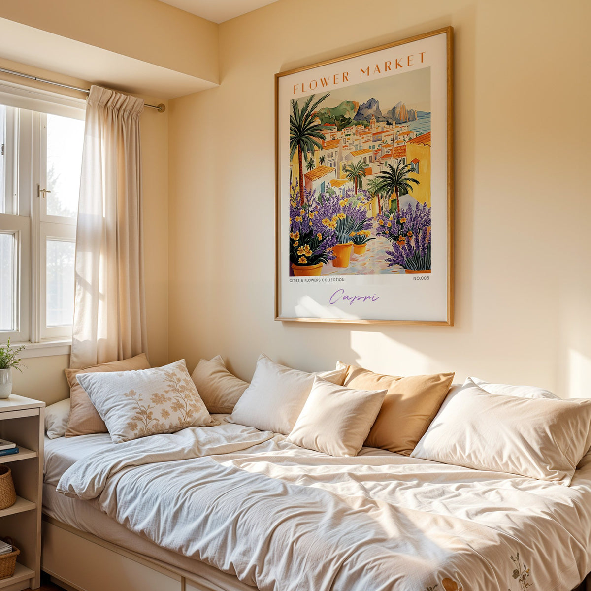 Capri flower market print in an oak frame above a cream daybed in a sunny bedroom