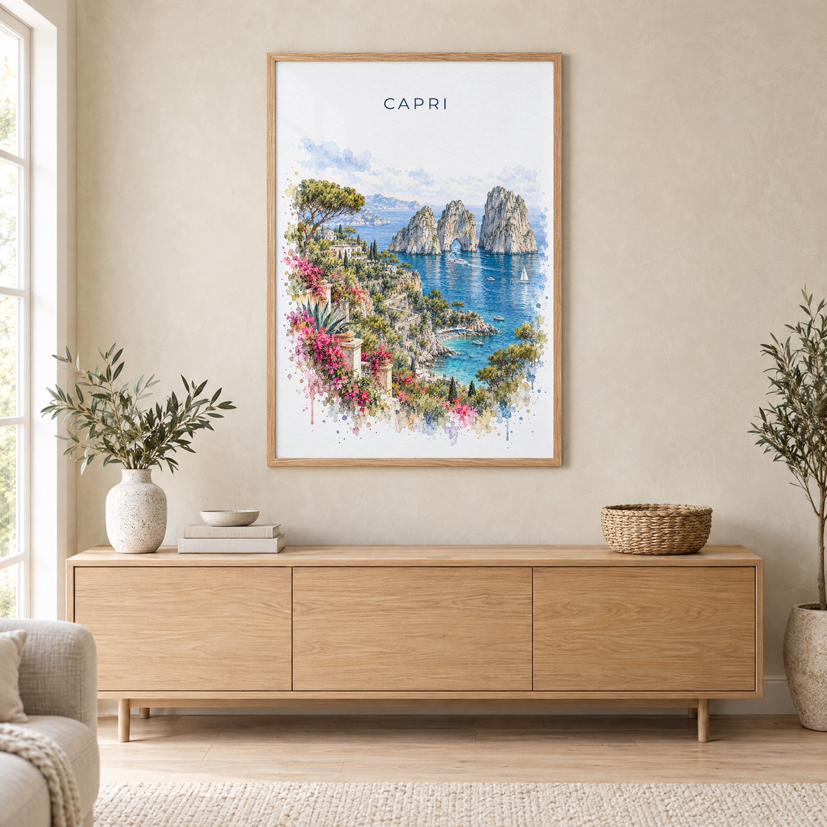 Capri watercolor print in an oak frame above a light wood sideboard in a Scandinavian living room