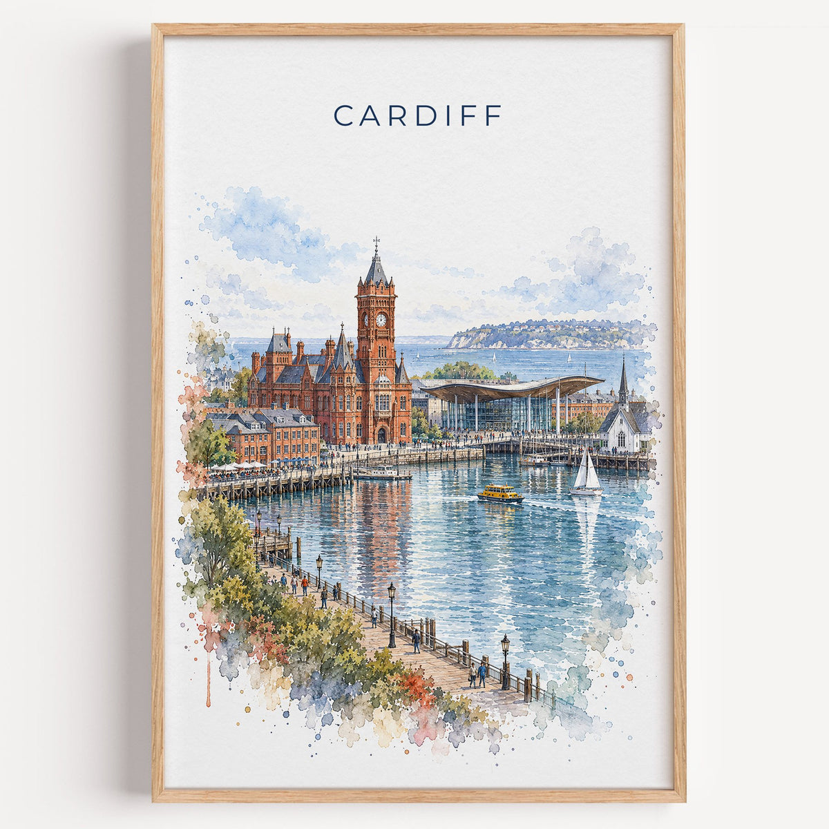 Cardiff watercolor print in a light oak frame on a plain white wall