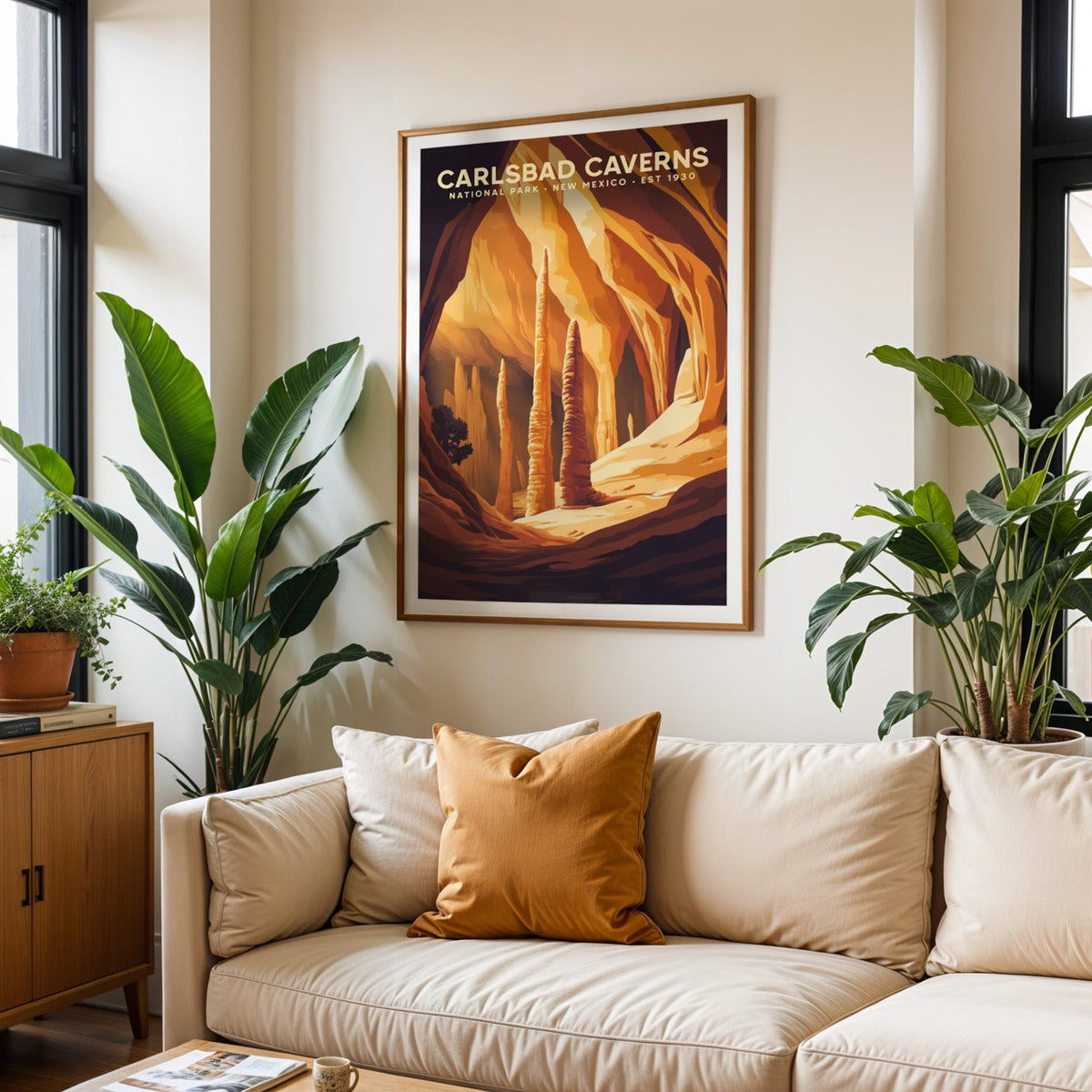 Carlsbad Caverns print in an oak frame above a cream living room sofa with an ochre cushion