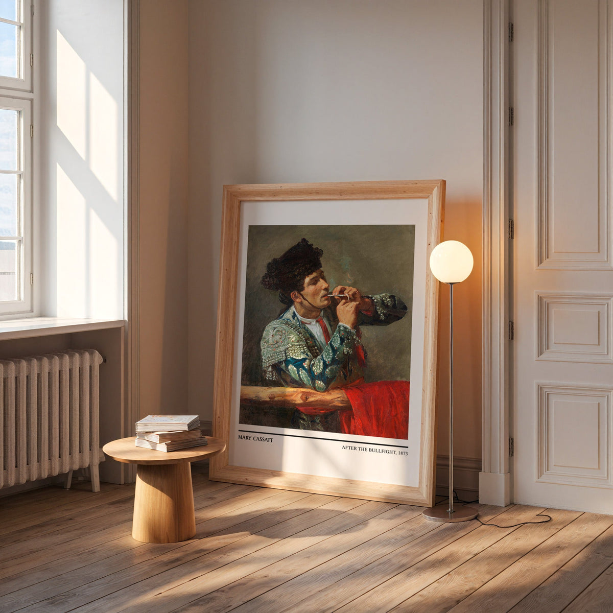 Bullfighter resting print in a wide pine frame leaning by a sunlit window
