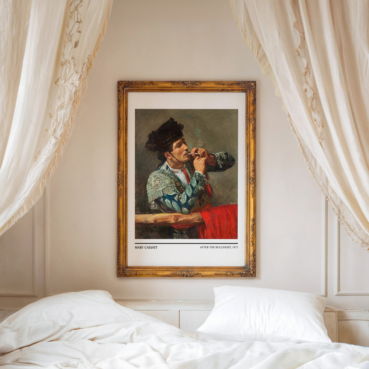 Cassatt matador print shown in an ornate gold frame above a canopy bed
