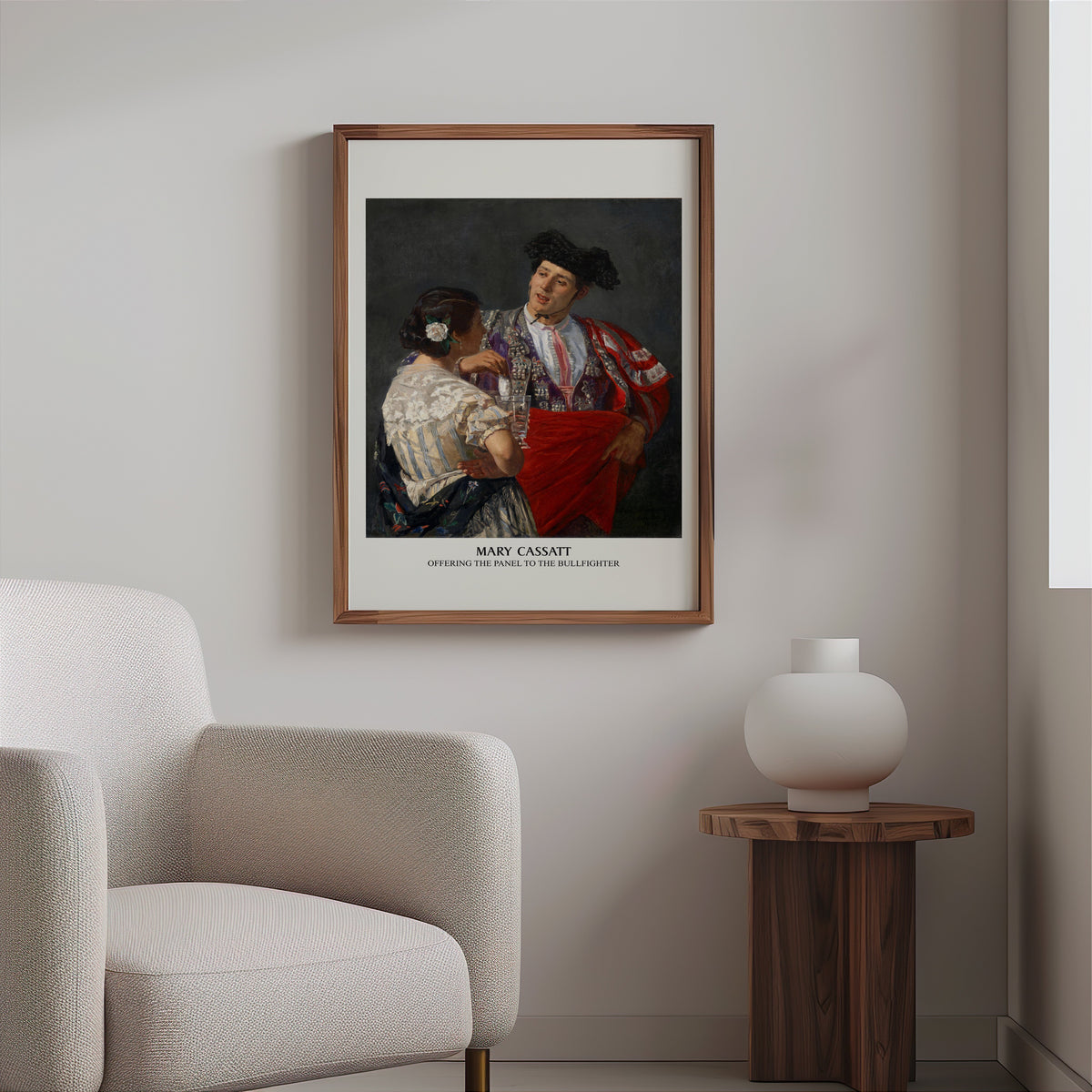 Spanish figure painting print in a slim walnut frame above a bouclé armchair