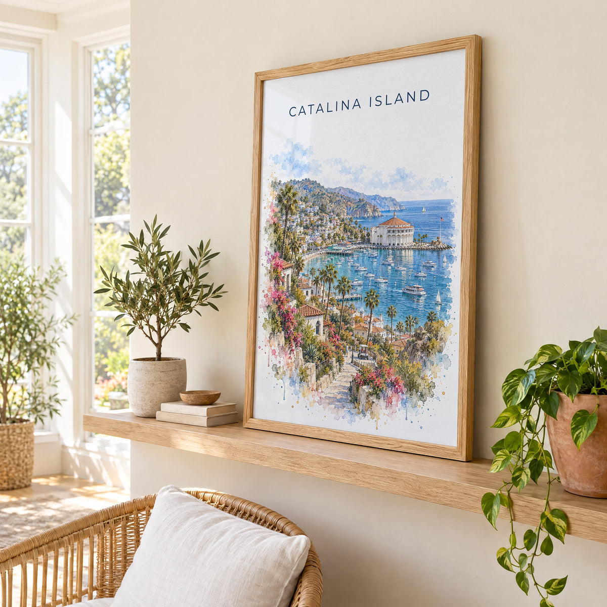 Catalina Island watercolor print in an oak frame on a picture ledge in a sunlit sunroom