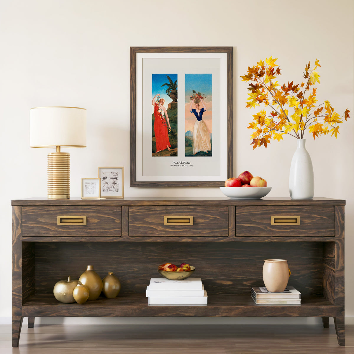 The Four Seasons print in a walnut frame above a console with autumn branches