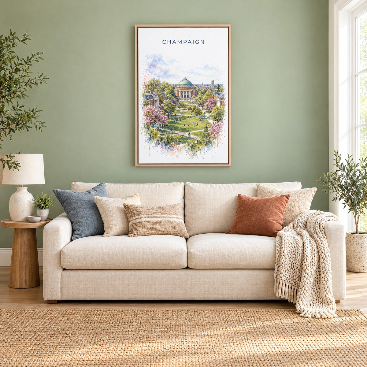 Champaign watercolor print as a natural floater canvas above a cream linen sofa on a sage green wall