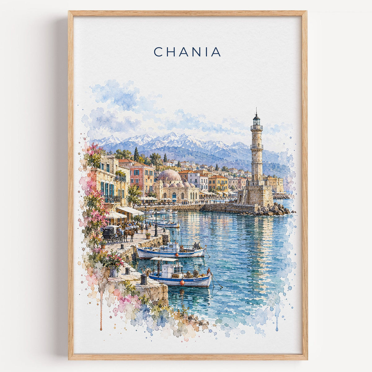 Chania watercolor print in a light oak frame on a plain white wall