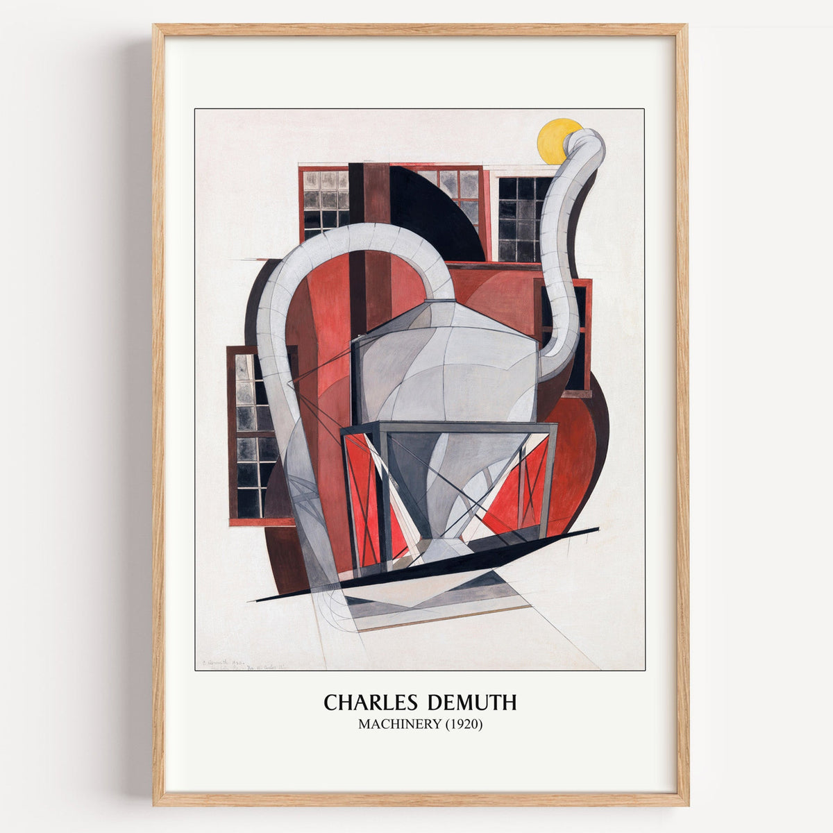 Charles Demuth Machinery print in a light oak frame on a plain white wall