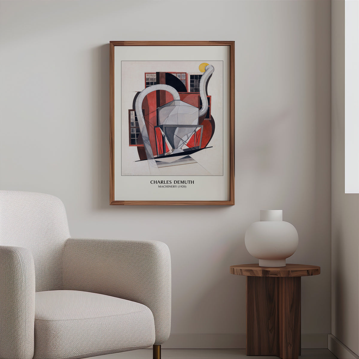 Industrial modern print in a slim walnut frame above a bouclé armchair