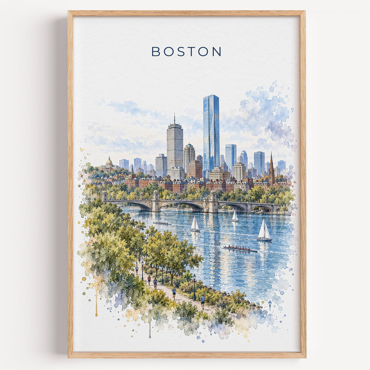Charles River Boston watercolor print in a light oak frame on a plain white wall
