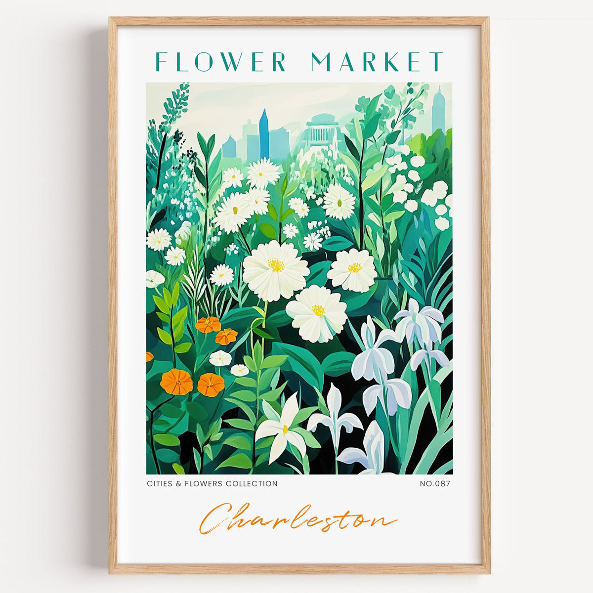 Charleston flower market print in a light oak frame on a plain white wall