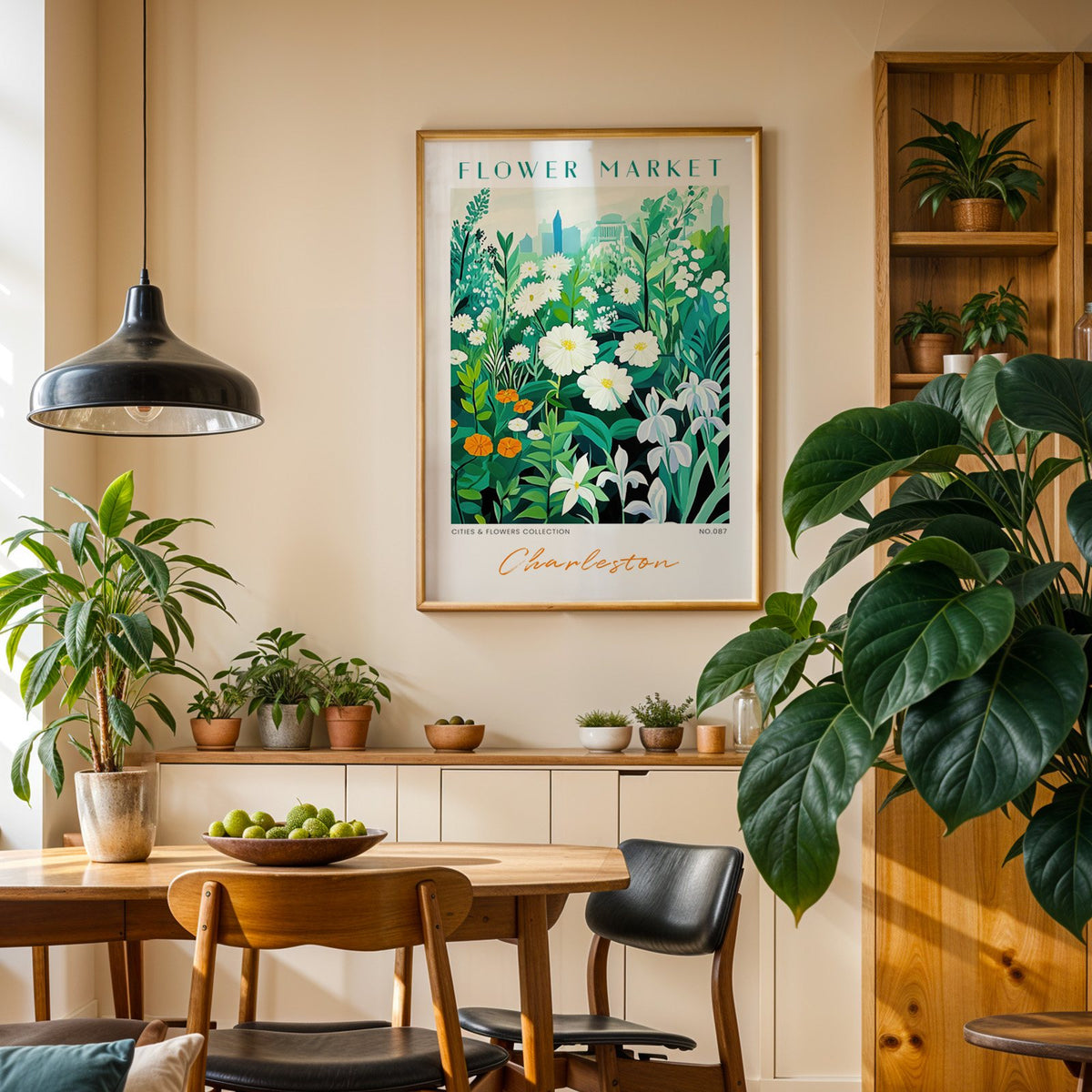 Charleston flower market print in an oak frame above a dining sideboard lined with potted plants