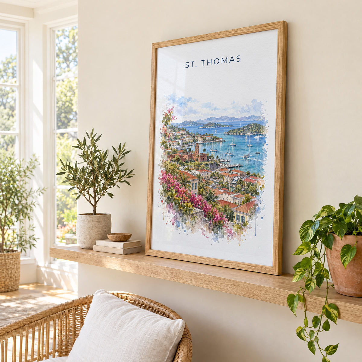 St. Thomas watercolor print in an oak frame on a picture ledge in a sunlit sunroom
