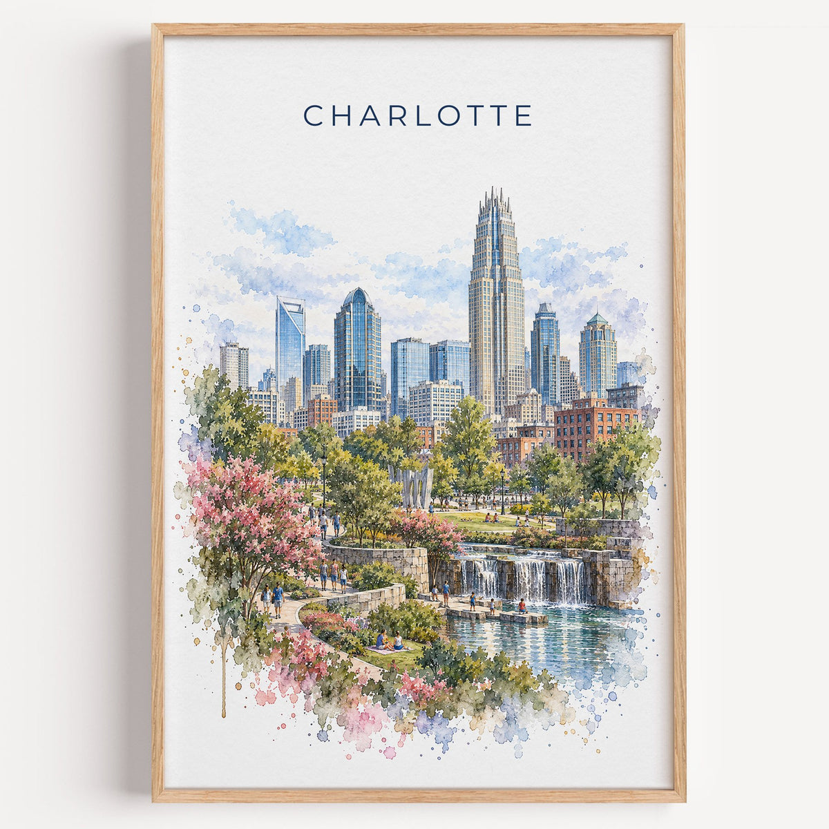 Charlotte watercolor print in a light oak frame on a plain white wall