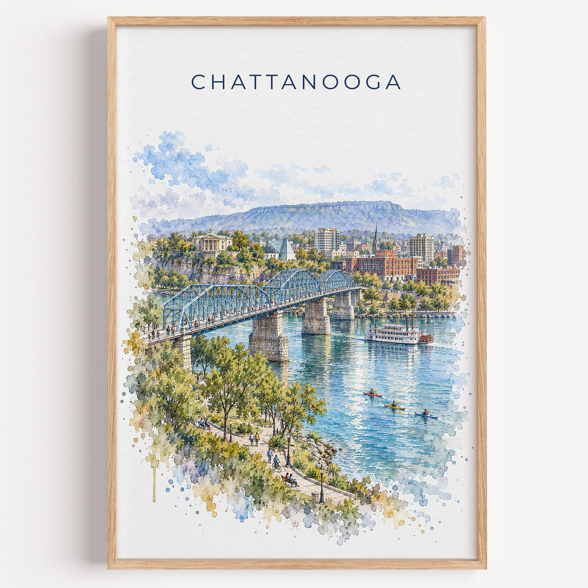 Chattanooga watercolor print in a light oak frame on a plain white wall