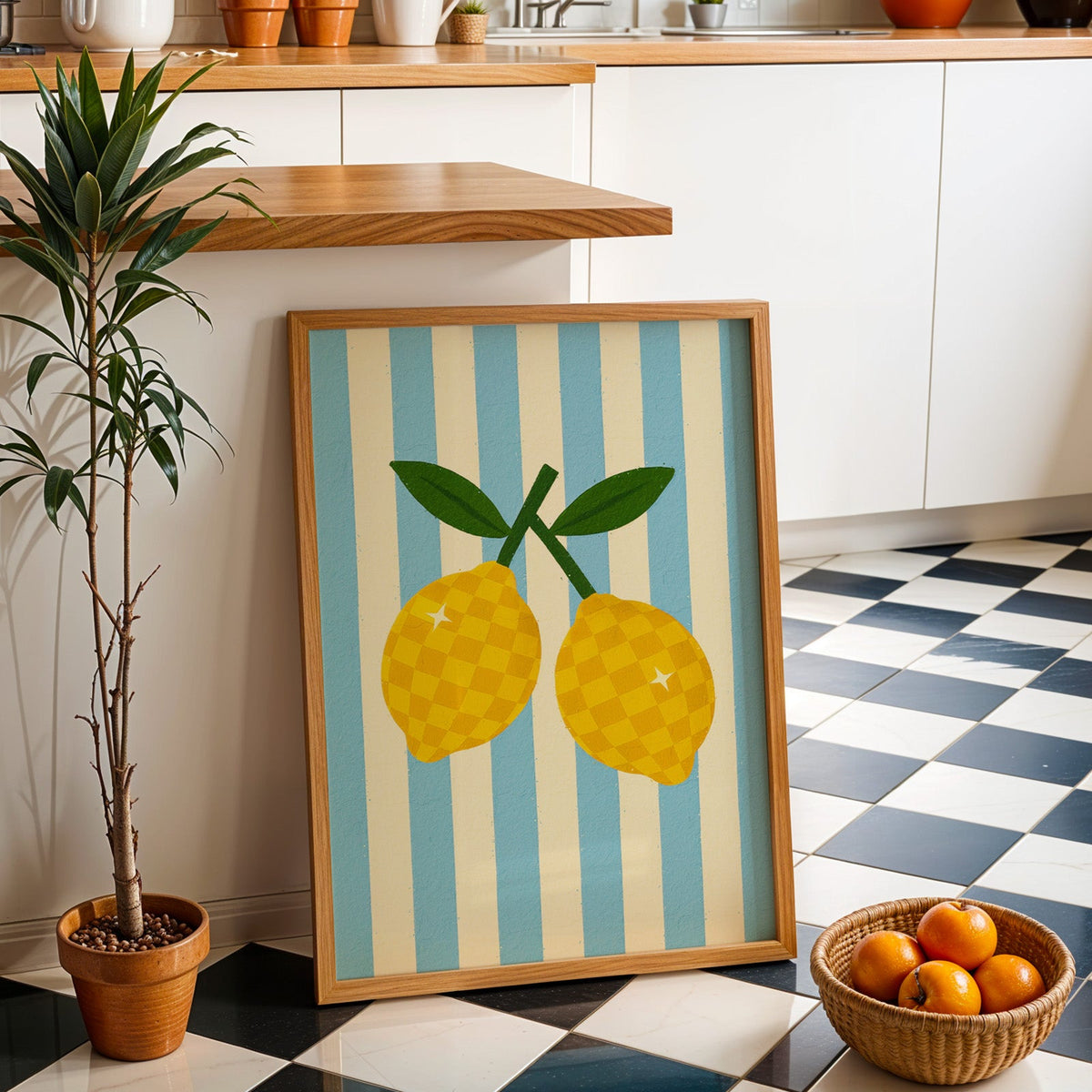 Checkered lemons print in an oak frame by a kitchen island and checkered floor