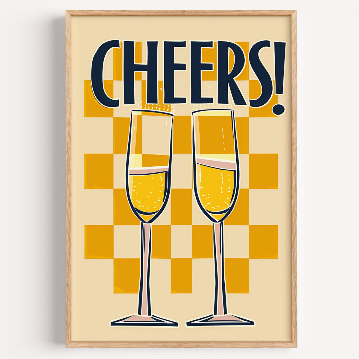 Cheers champagne flutes print in a light oak frame on a plain white wall