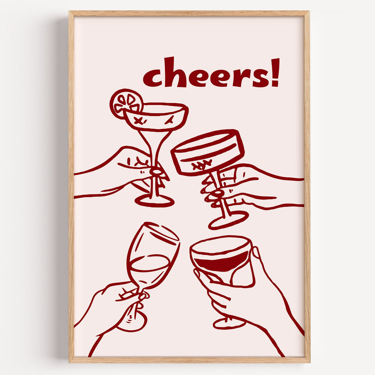 cheers! four hands toasting burgundy line print in a light oak frame on a plain white wall