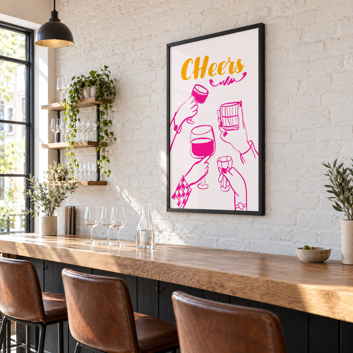 CHeers hot pink toasting hands print in a black frame on a white brick wall above a wine bar counter