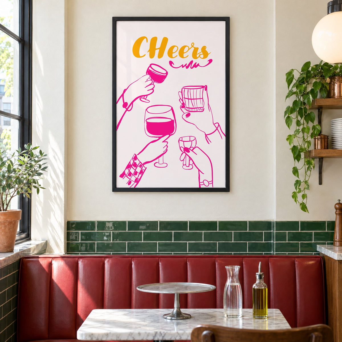 CHeers hot pink toasting hands print in a black frame above a red leather booth in a sunny pizzeria