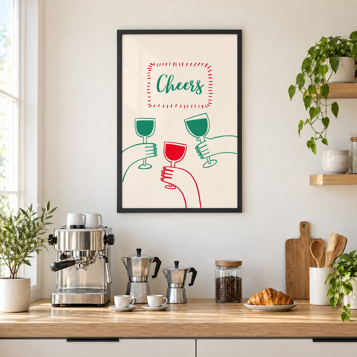 Cheers three hands wine toast line print in a black frame above a home espresso bar with moka pots and espresso cups