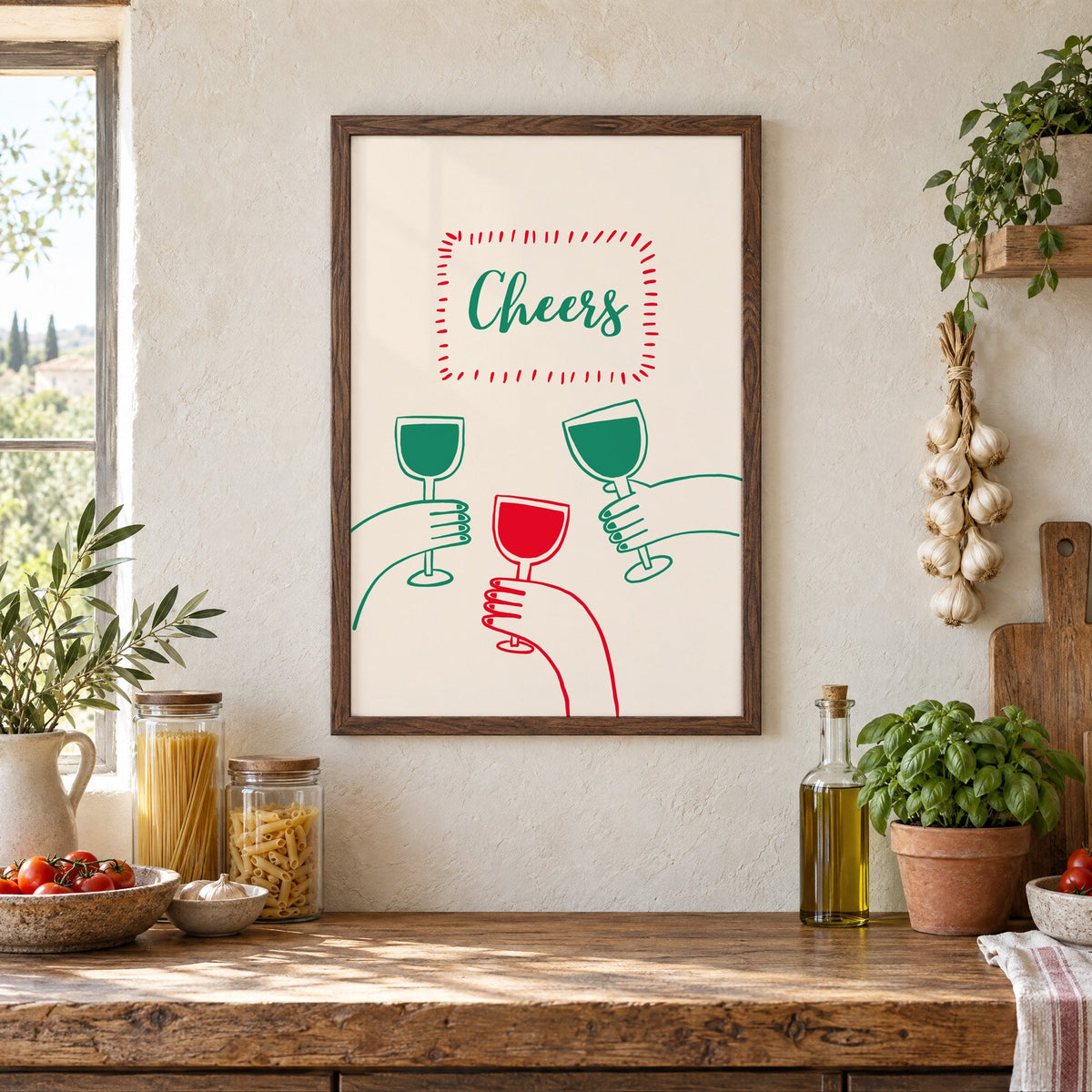 Cheers three hands wine toast line print in a walnut frame above a rustic Italian pantry counter with pasta jars, garlic and tomatoes