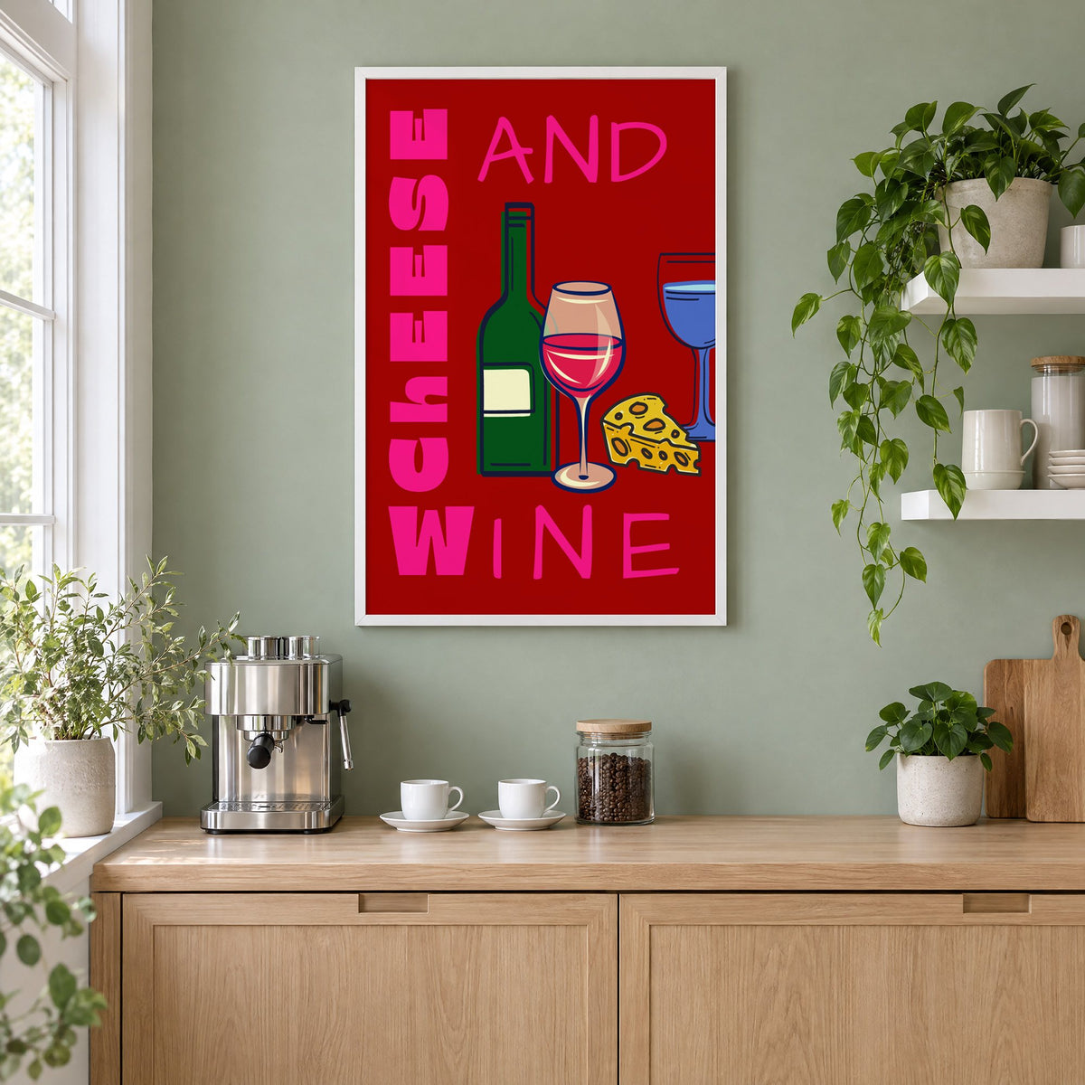 Cheese and wine bold red pink print in a white frame on a sage green coffee nook wall above an espresso machine