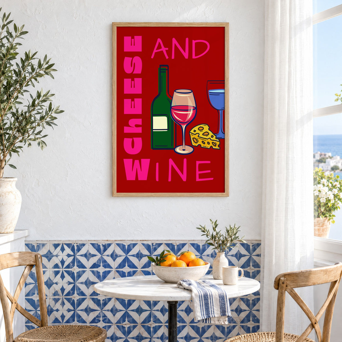 Cheese and wine bold red pink print in an oak frame above a bistro table and blue patterned tiles