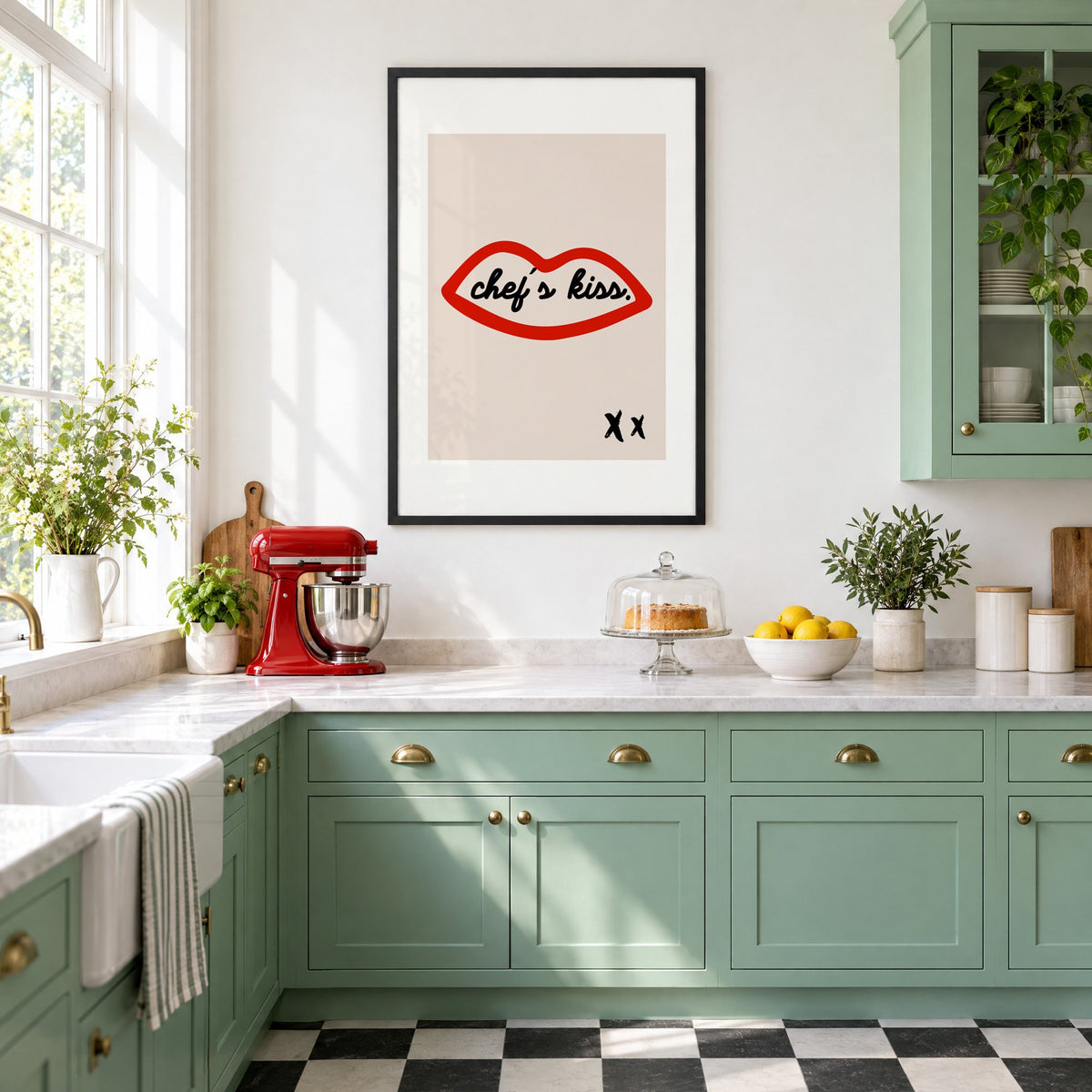 Chef's kiss red lips outline print in a black frame in a mint green retro kitchen above a red stand mixer