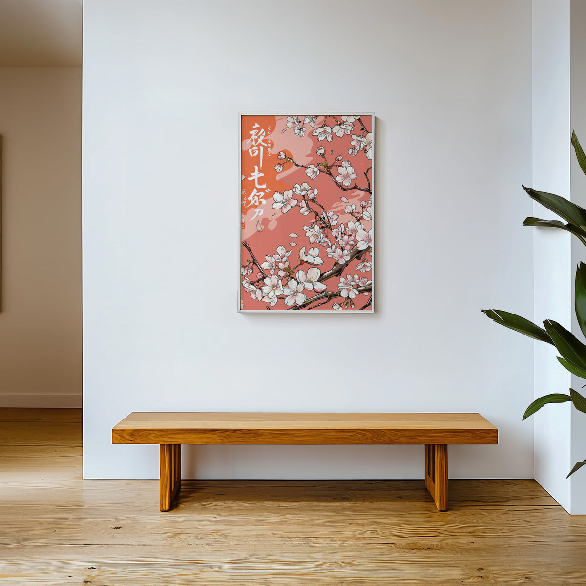 Cherry blossom branch on coral print shown in a white frame above a wooden entryway bench