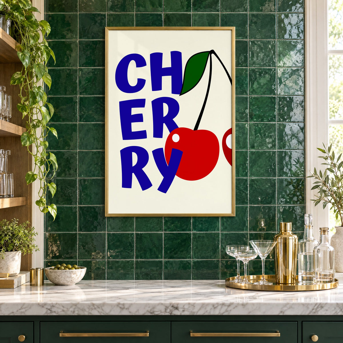 Cherry bold navy letters print in a brass frame on emerald green tiles above a home bar with coupe glasses