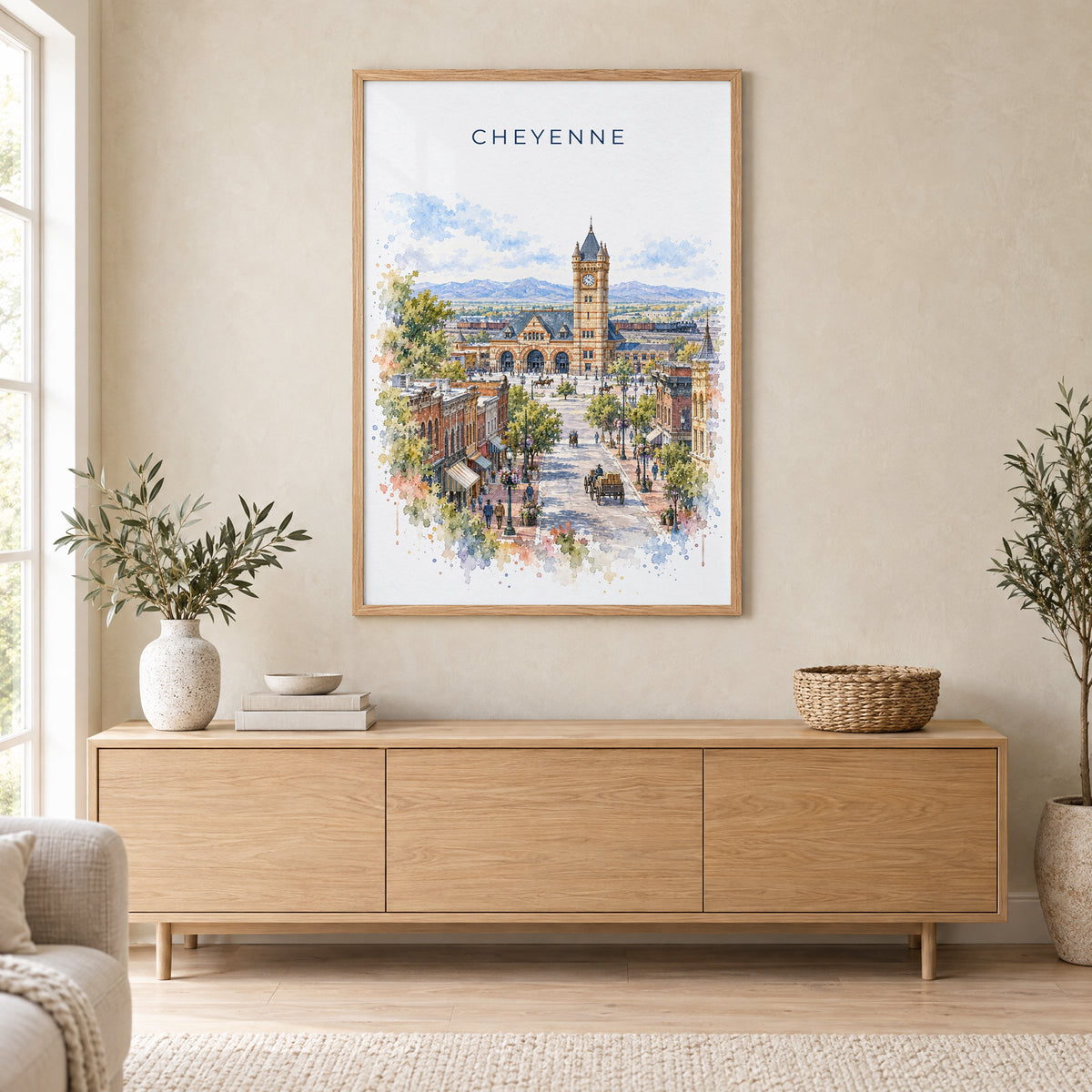 Cheyenne watercolor print in an oak frame above a light wood sideboard in a Scandinavian living room