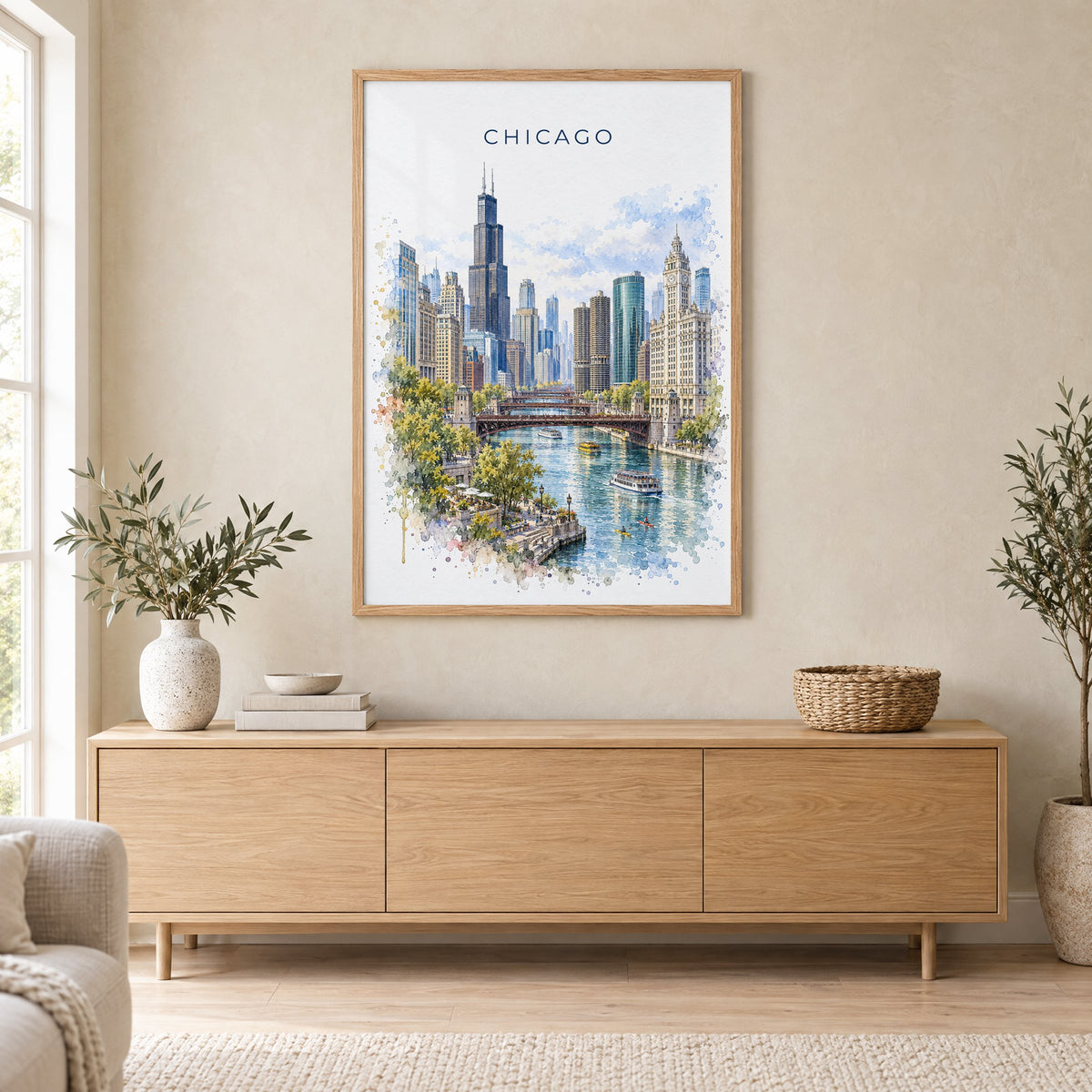 Chicago watercolor print in an oak frame above a light wood sideboard in a Scandinavian living room