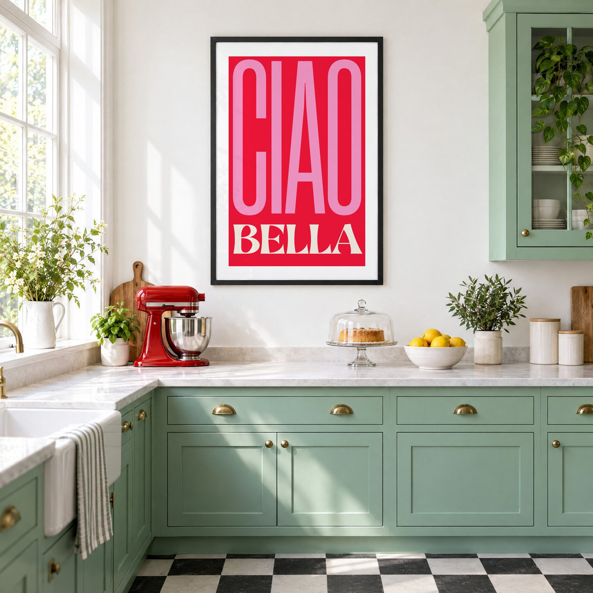 Ciao Bella pink and red type print in a black frame in a mint green retro kitchen above a red stand mixer