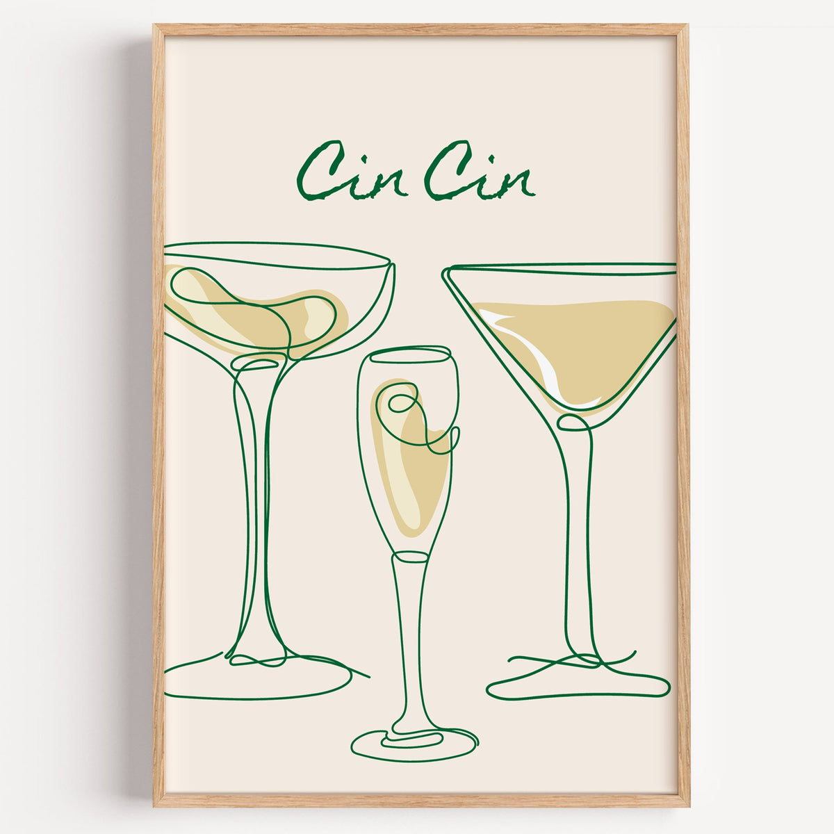 Cin Cin continuous line cocktail glasses print in a light oak frame on a plain white wall