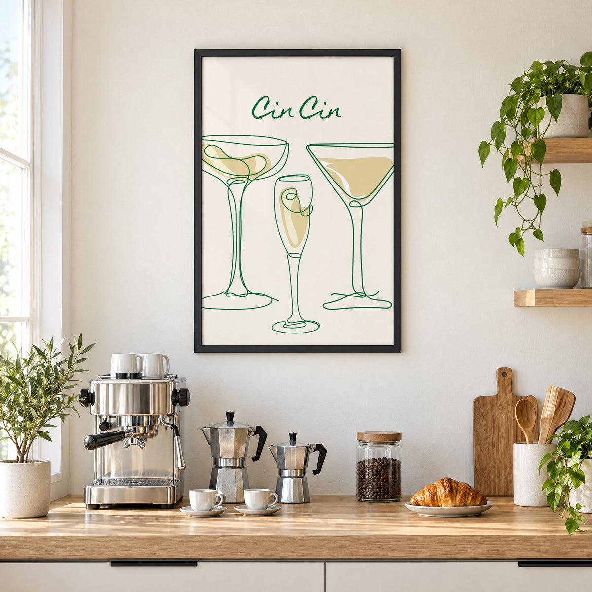 Cin Cin continuous line cocktail glasses print in a black frame above a home espresso bar with moka pots and espresso cups