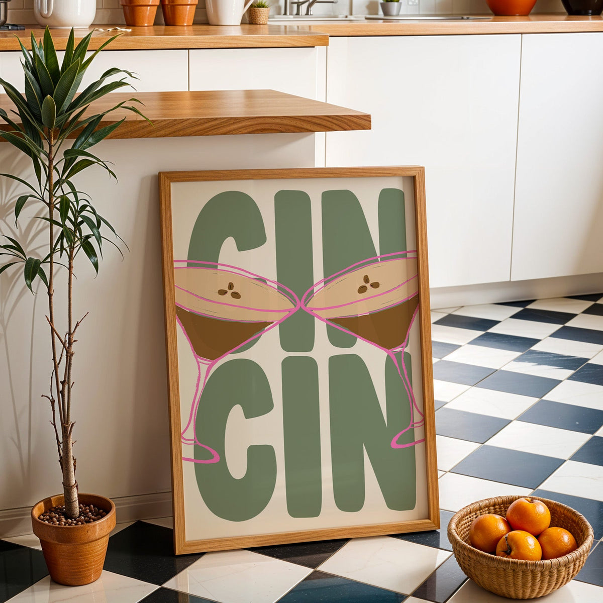 Cin cin espresso martini print in an oak frame by a kitchen island and tiled floor