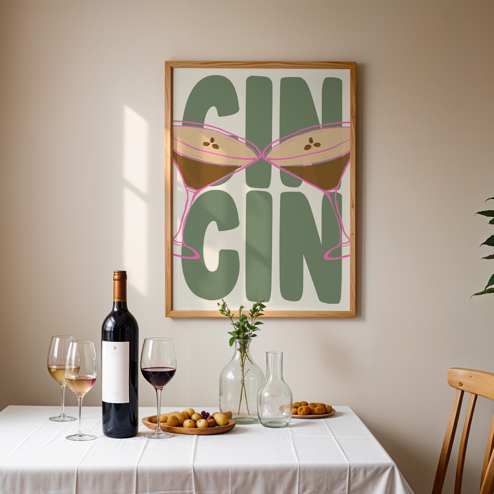 Cin cin espresso martini print in an oak frame above a table laid with wine