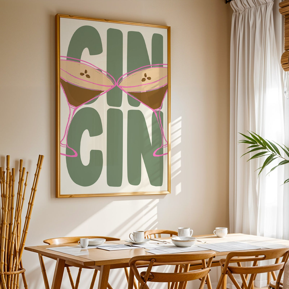Cin cin espresso martini print in a gold frame above a sunlit breakfast table