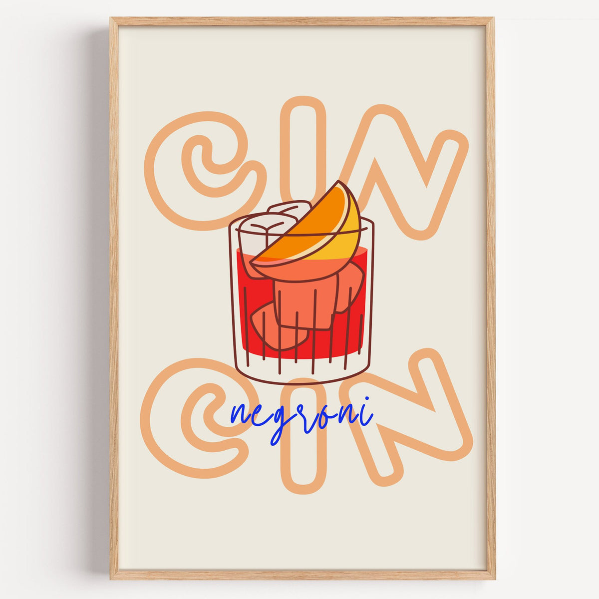 Cin Cin negroni orange slice print in a light oak frame on a plain white wall