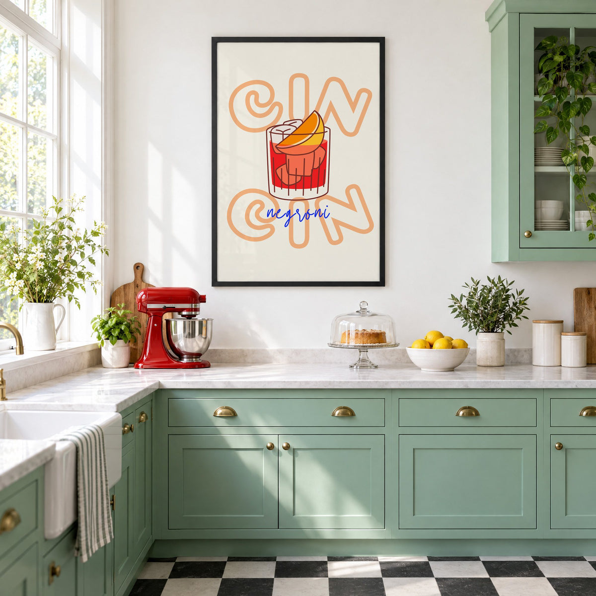 Cin Cin negroni orange slice print in a black frame in a mint green retro kitchen above a red stand mixer