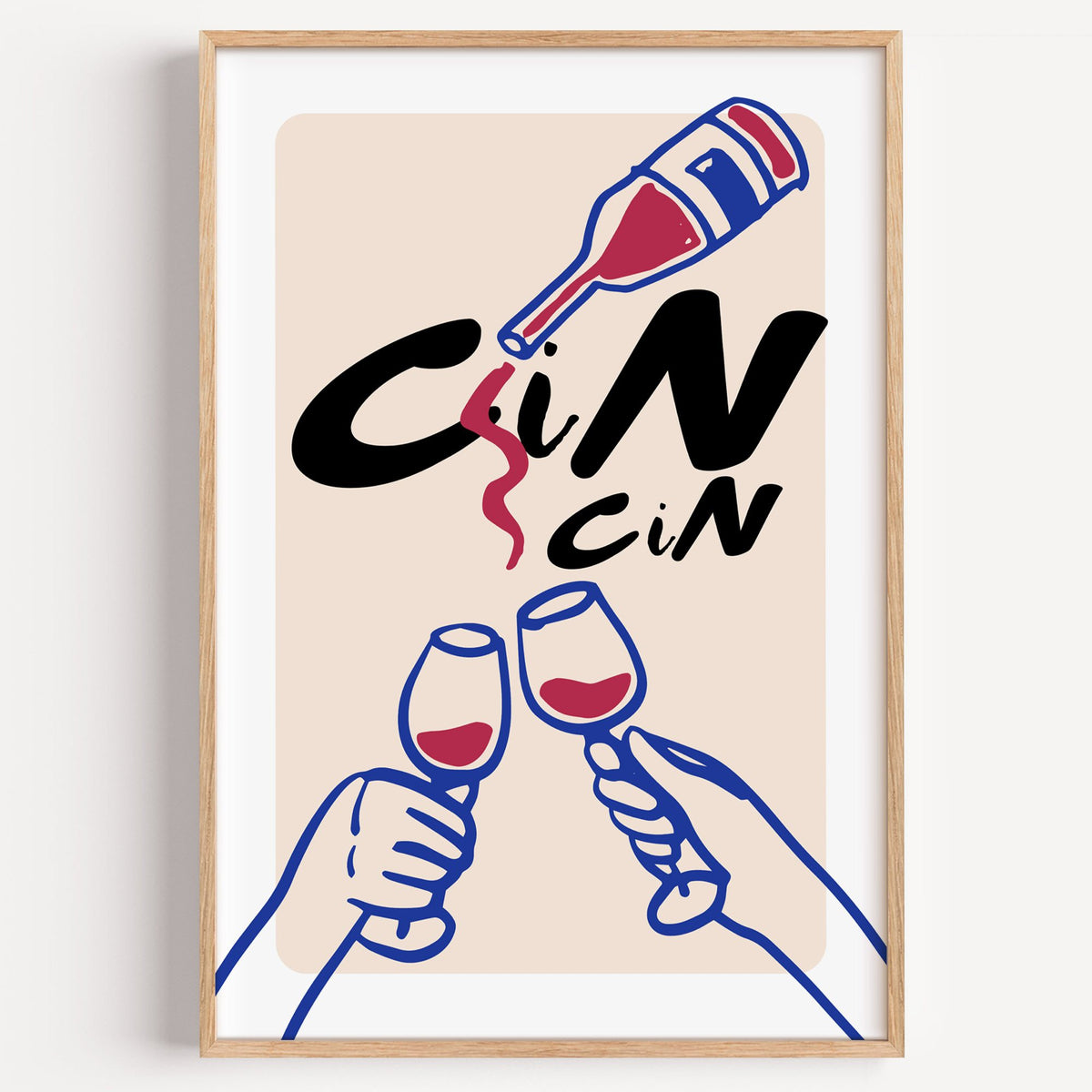 CiN CiN red wine toast print in a light oak frame on a plain white wall