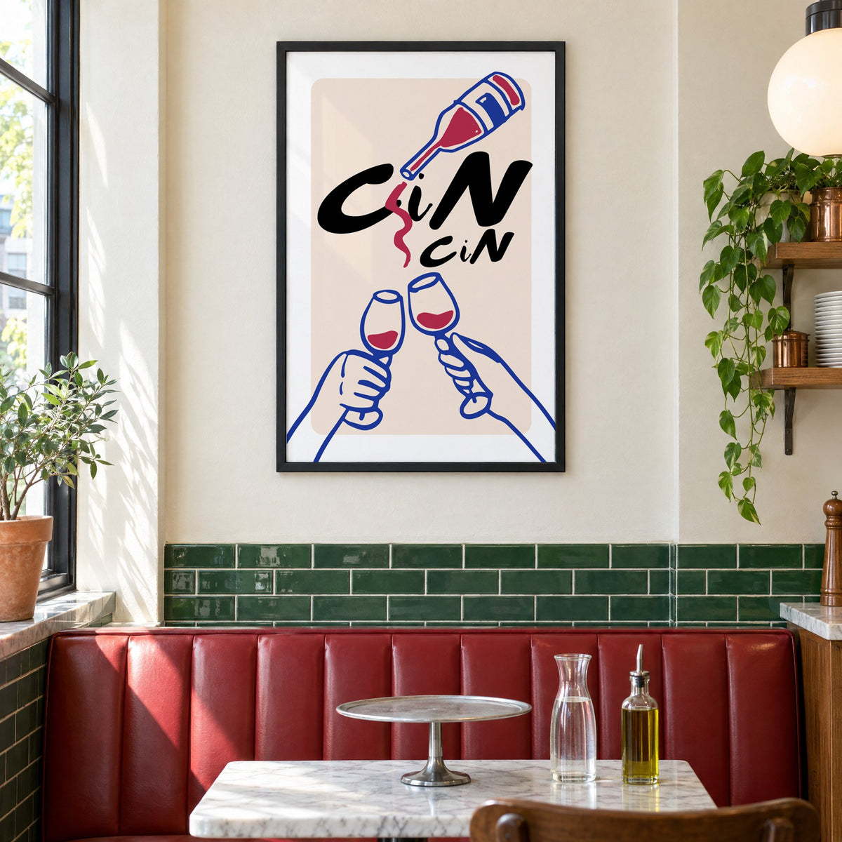 CiN CiN red wine toast print in a black frame above a red leather booth in a sunny pizzeria