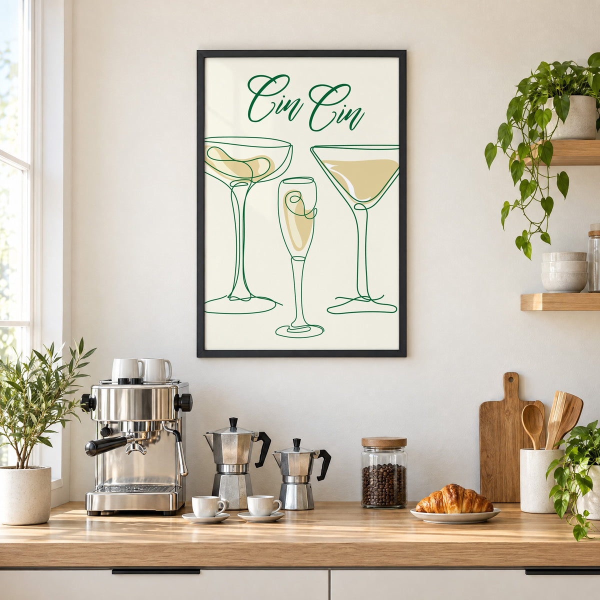 Cin Cin one-line coupe, flute and martini print in a black frame above a home espresso bar with moka pots and espresso cups