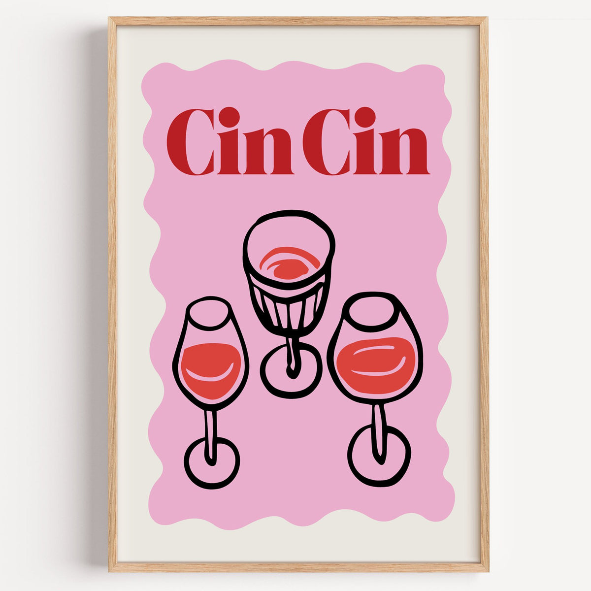 Cin Cin three glasses top view print in a light oak frame on a plain white wall