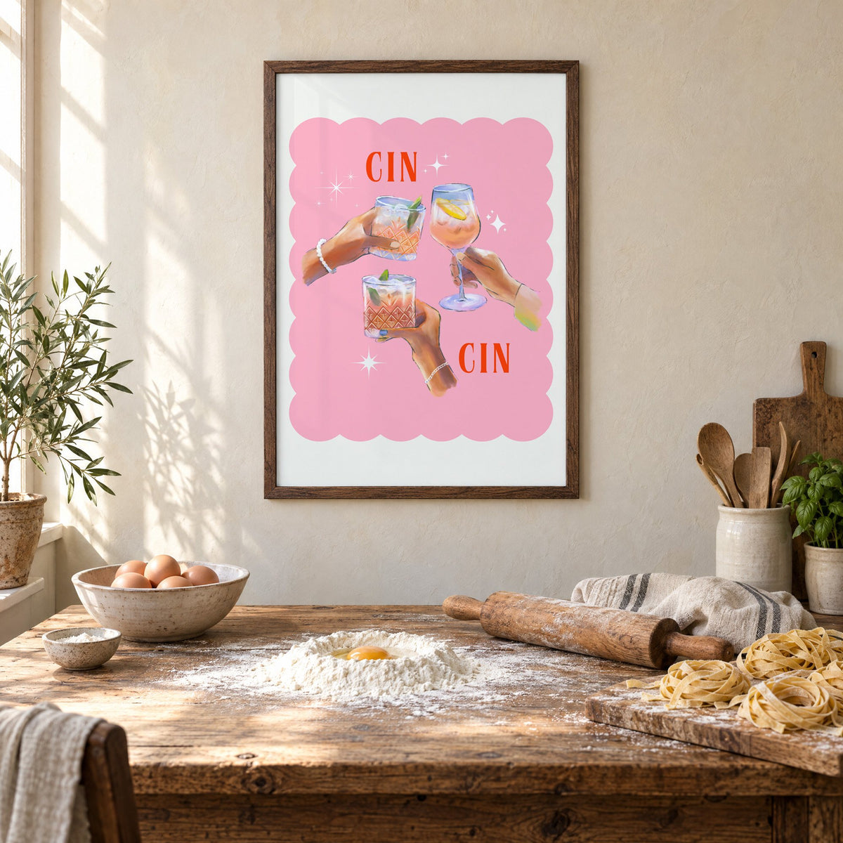 Cin Cin three hands toasting print in a walnut frame above a rustic table set for making fresh pasta