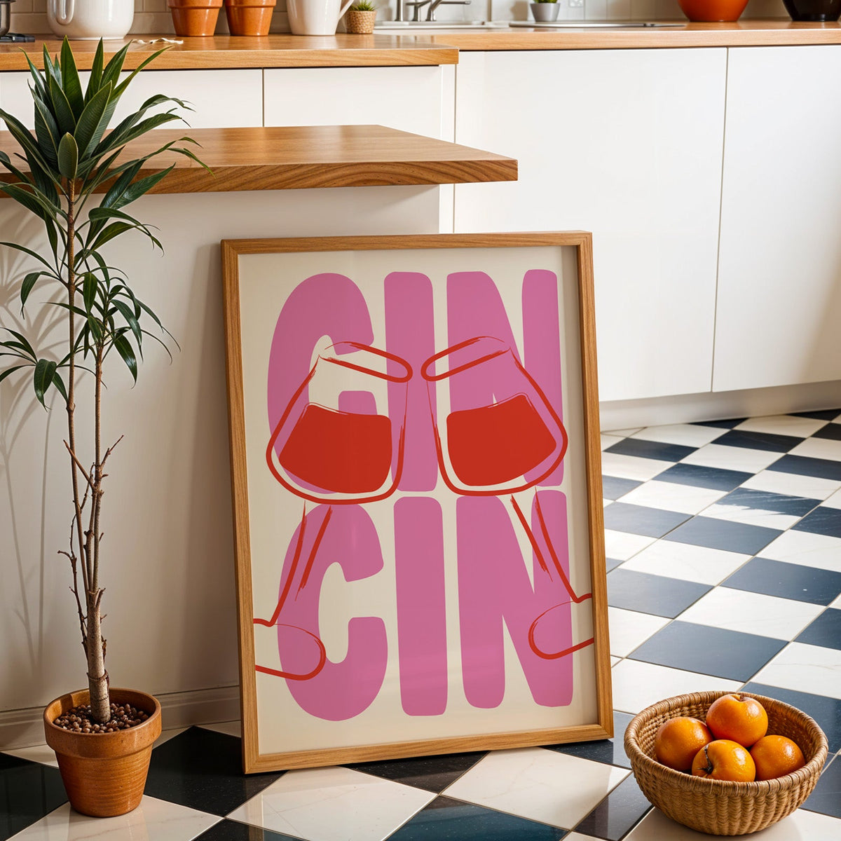 Cin cin wine glasses print in an oak frame by a kitchen island and checkered floor